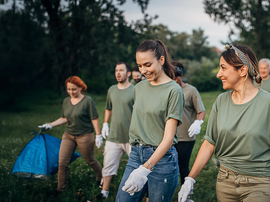 A group of volunteers walking outdoors 